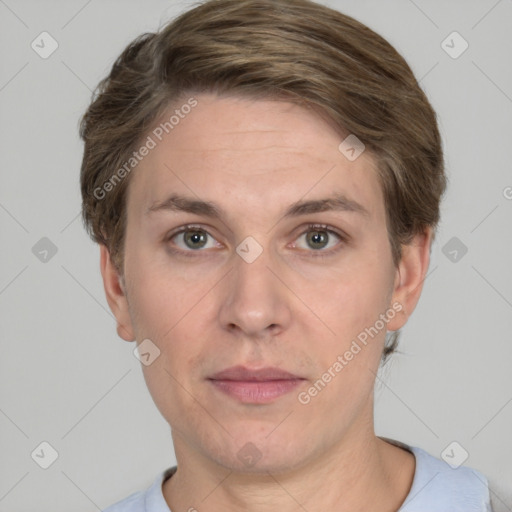 Joyful white adult female with short  brown hair and grey eyes