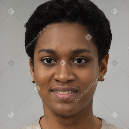 Joyful black young-adult female with short  black hair and brown eyes