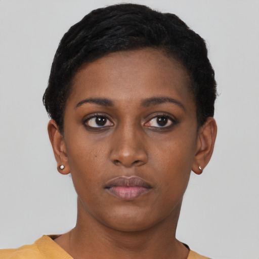 Neutral black young-adult female with short  black hair and brown eyes
