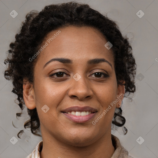 Joyful black young-adult female with medium  brown hair and brown eyes