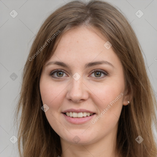 Joyful white young-adult female with long  brown hair and grey eyes