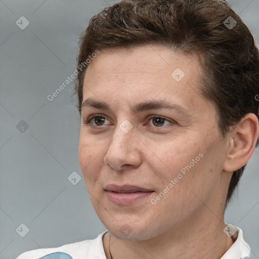 Joyful white adult female with short  brown hair and brown eyes