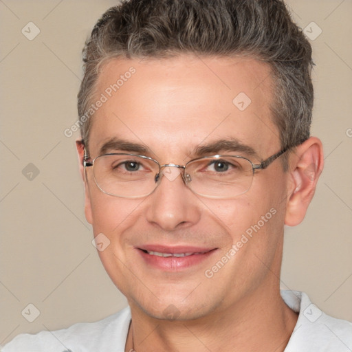 Joyful white adult male with short  brown hair and brown eyes