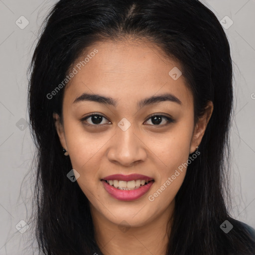 Joyful latino young-adult female with long  brown hair and brown eyes