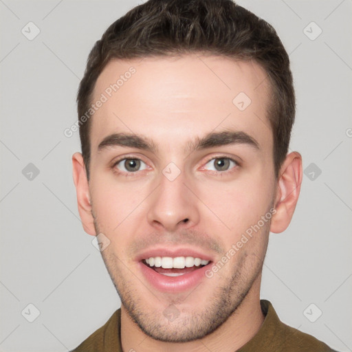 Joyful white young-adult male with short  brown hair and brown eyes