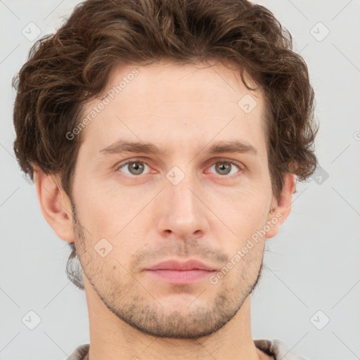 Neutral white young-adult male with short  brown hair and grey eyes