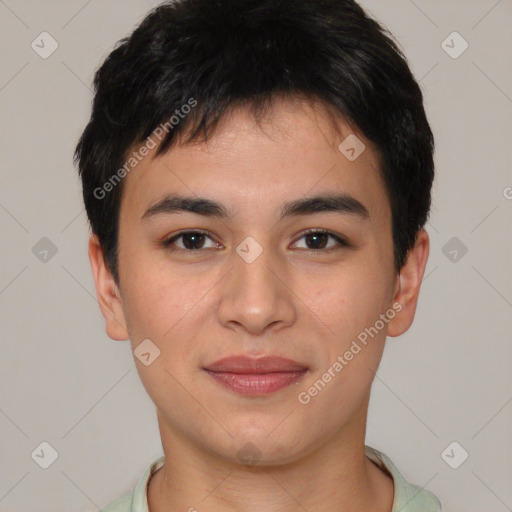 Joyful asian young-adult male with short  brown hair and brown eyes