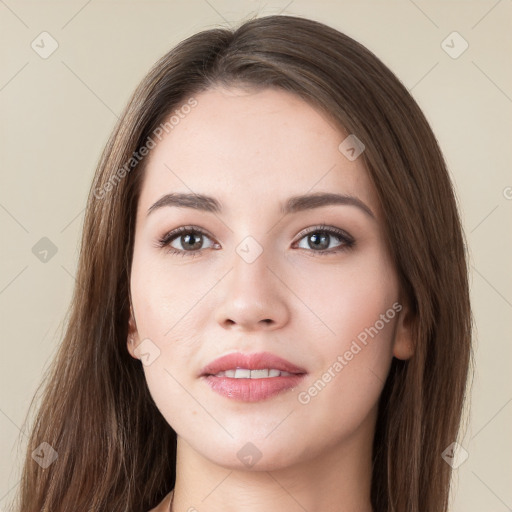 Neutral white young-adult female with long  brown hair and brown eyes