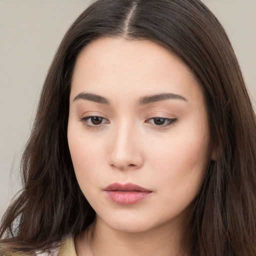 Neutral white young-adult female with long  brown hair and brown eyes