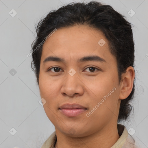 Joyful latino young-adult female with short  brown hair and brown eyes