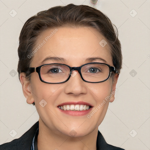 Joyful white young-adult female with short  brown hair and blue eyes