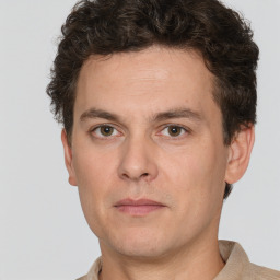 Neutral white adult male with short  brown hair and brown eyes