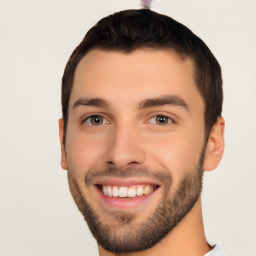 Joyful white young-adult male with short  black hair and brown eyes