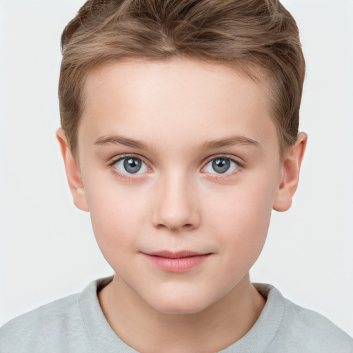 Joyful white child female with short  brown hair and grey eyes