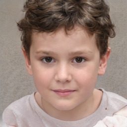 Joyful white child male with short  brown hair and brown eyes