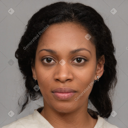 Joyful black young-adult female with medium  black hair and brown eyes