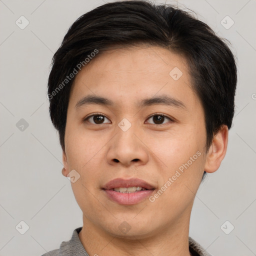 Joyful asian young-adult male with short  brown hair and brown eyes