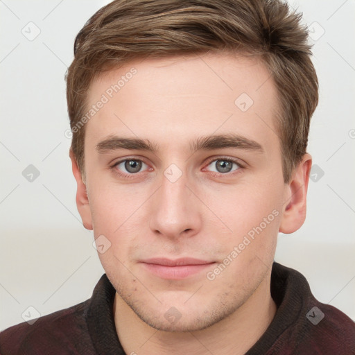 Neutral white young-adult male with short  brown hair and grey eyes