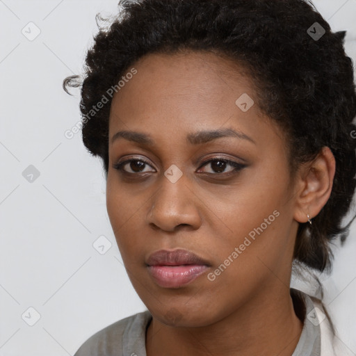 Neutral black young-adult female with short  brown hair and brown eyes