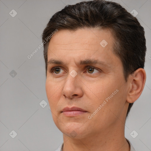 Neutral white adult male with short  brown hair and brown eyes