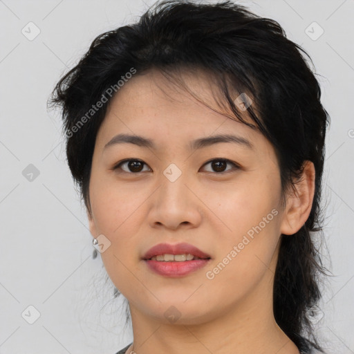 Joyful asian young-adult female with medium  black hair and brown eyes