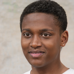 Joyful black young-adult male with short  brown hair and brown eyes