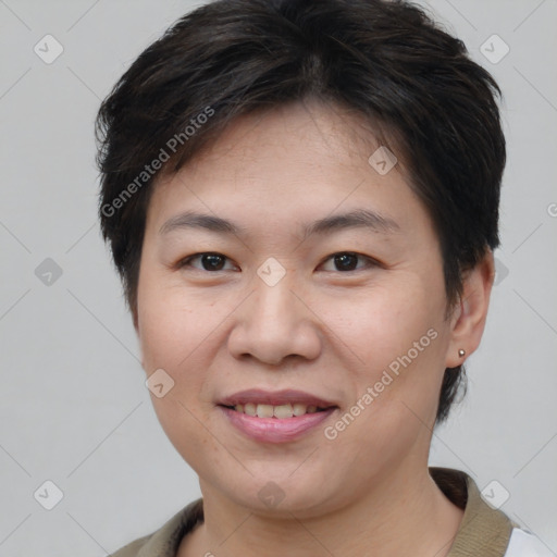 Joyful asian young-adult female with short  brown hair and brown eyes