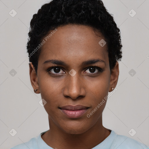 Joyful black young-adult female with short  black hair and brown eyes