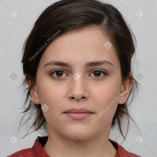 Neutral white young-adult female with medium  brown hair and brown eyes