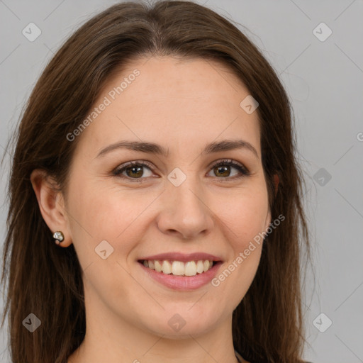 Joyful white young-adult female with long  brown hair and green eyes