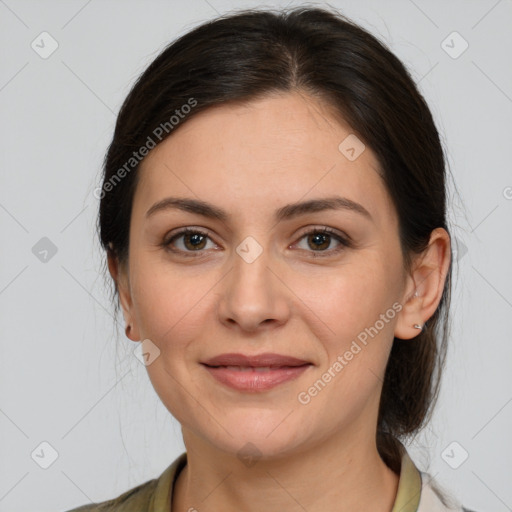 Joyful white young-adult female with medium  brown hair and brown eyes