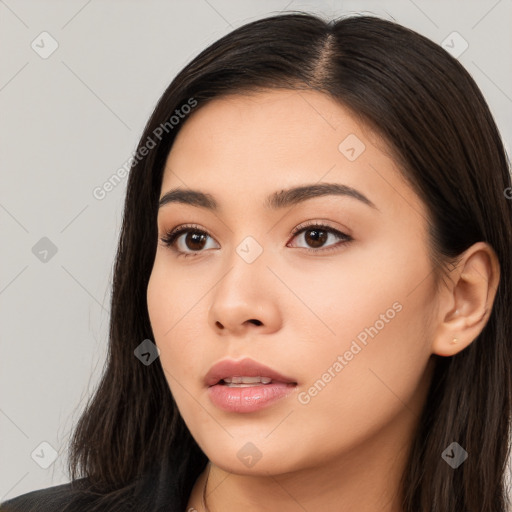 Neutral white young-adult female with long  brown hair and brown eyes