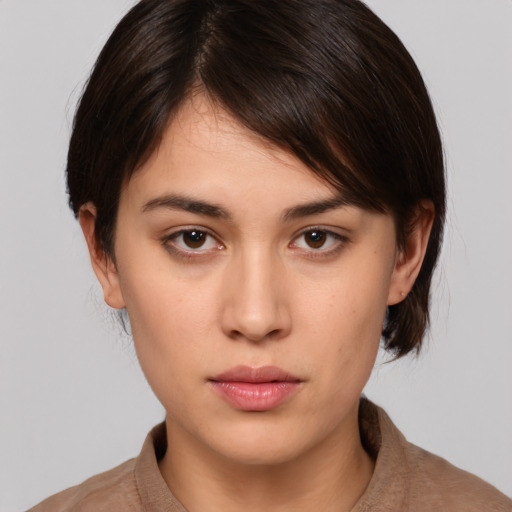 Neutral white young-adult female with medium  brown hair and brown eyes