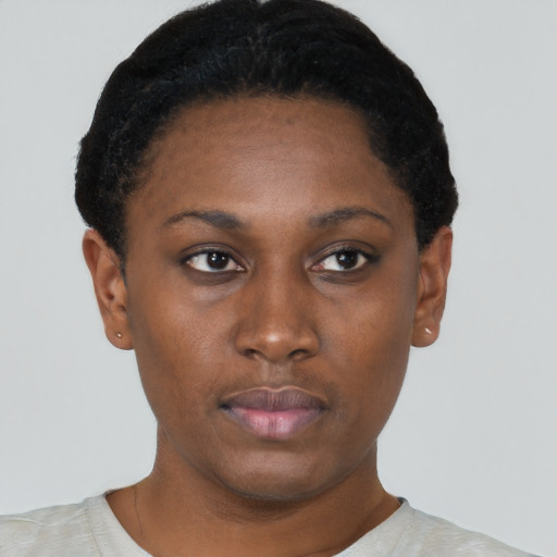 Neutral black young-adult female with short  black hair and brown eyes