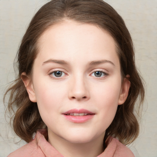 Joyful white child female with medium  brown hair and blue eyes