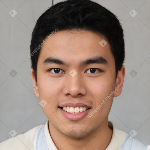 Joyful asian young-adult male with short  black hair and brown eyes