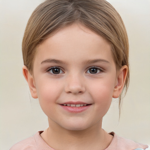 Joyful white child female with short  brown hair and brown eyes