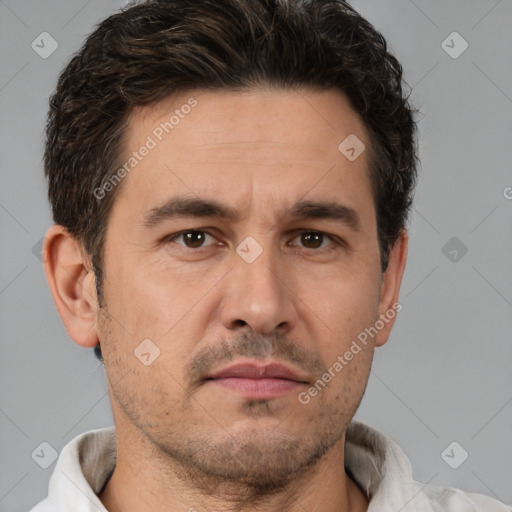 Neutral white adult male with short  brown hair and brown eyes