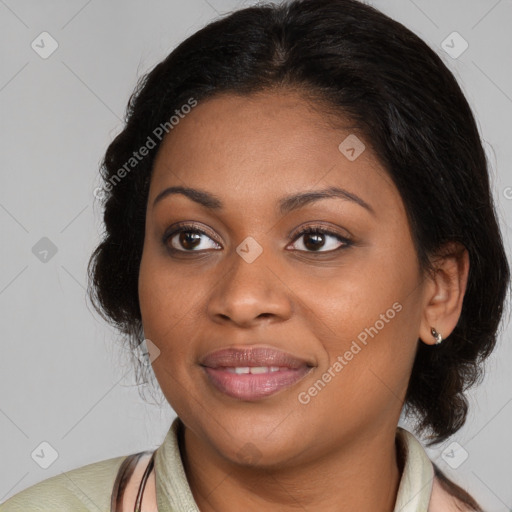 Joyful black young-adult female with medium  brown hair and brown eyes