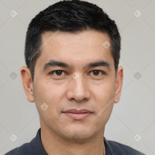 Joyful white young-adult male with short  black hair and brown eyes