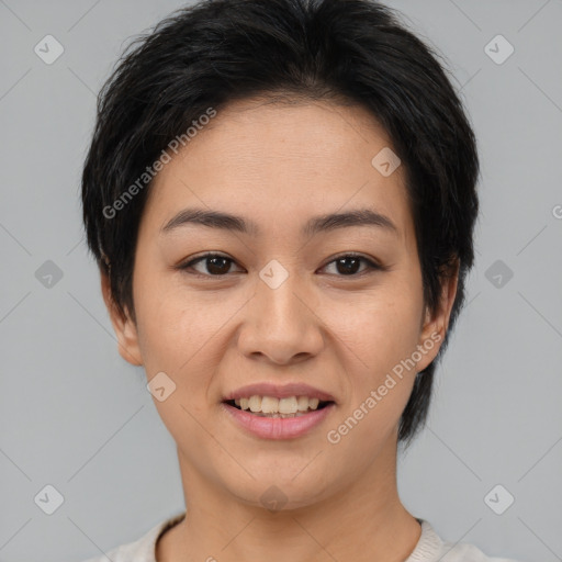 Joyful asian young-adult female with short  brown hair and brown eyes