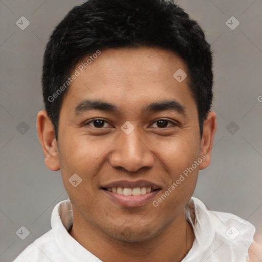 Joyful asian young-adult male with short  black hair and brown eyes