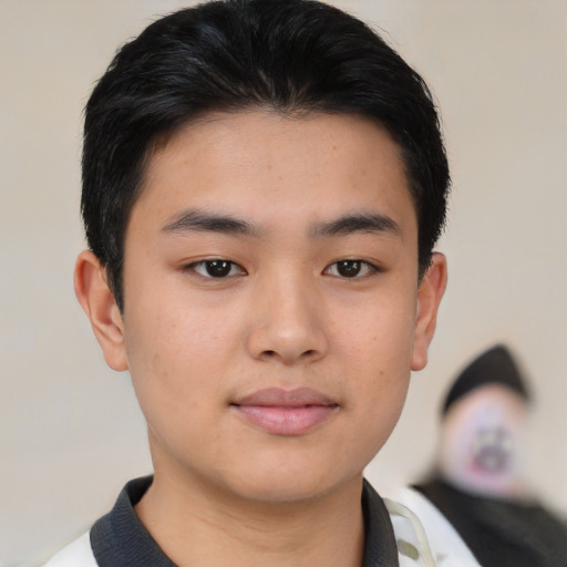 Neutral asian young-adult male with short  brown hair and brown eyes