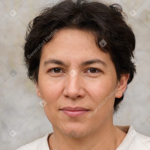 Joyful white adult female with short  brown hair and brown eyes