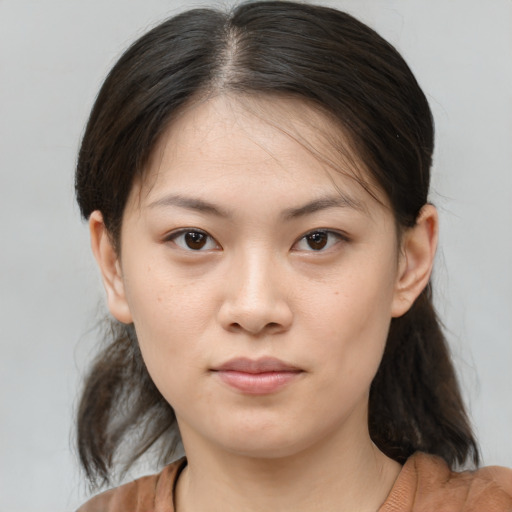 Neutral asian young-adult female with medium  brown hair and brown eyes