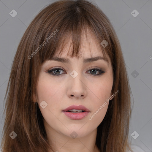 Neutral white young-adult female with long  brown hair and brown eyes