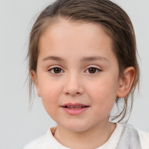 Joyful white child female with medium  brown hair and brown eyes