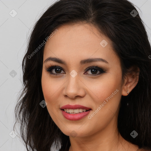 Joyful latino young-adult female with long  brown hair and brown eyes