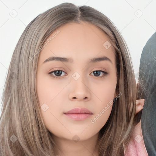 Neutral white young-adult female with long  brown hair and brown eyes