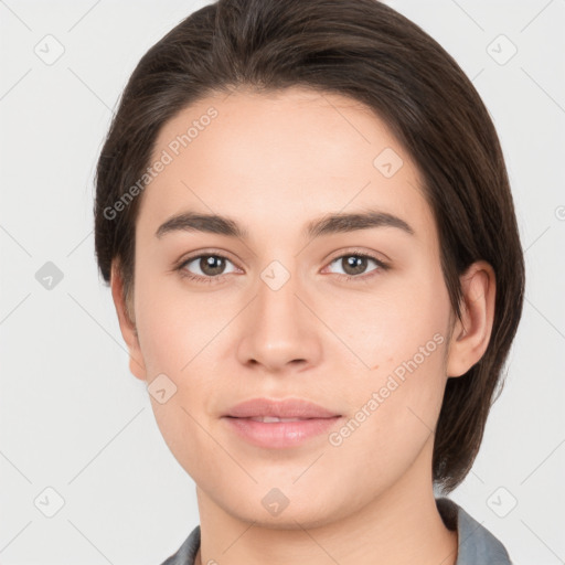 Neutral white young-adult female with medium  brown hair and brown eyes